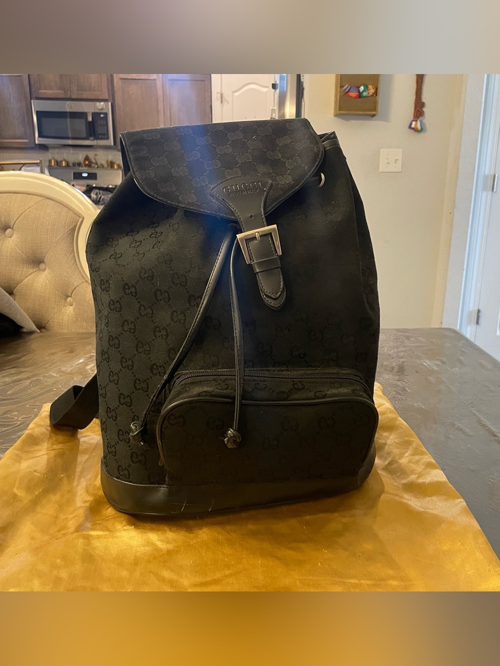 GG Monogram Black Monogram Drawstring Backpack with Front Pocket not authentic